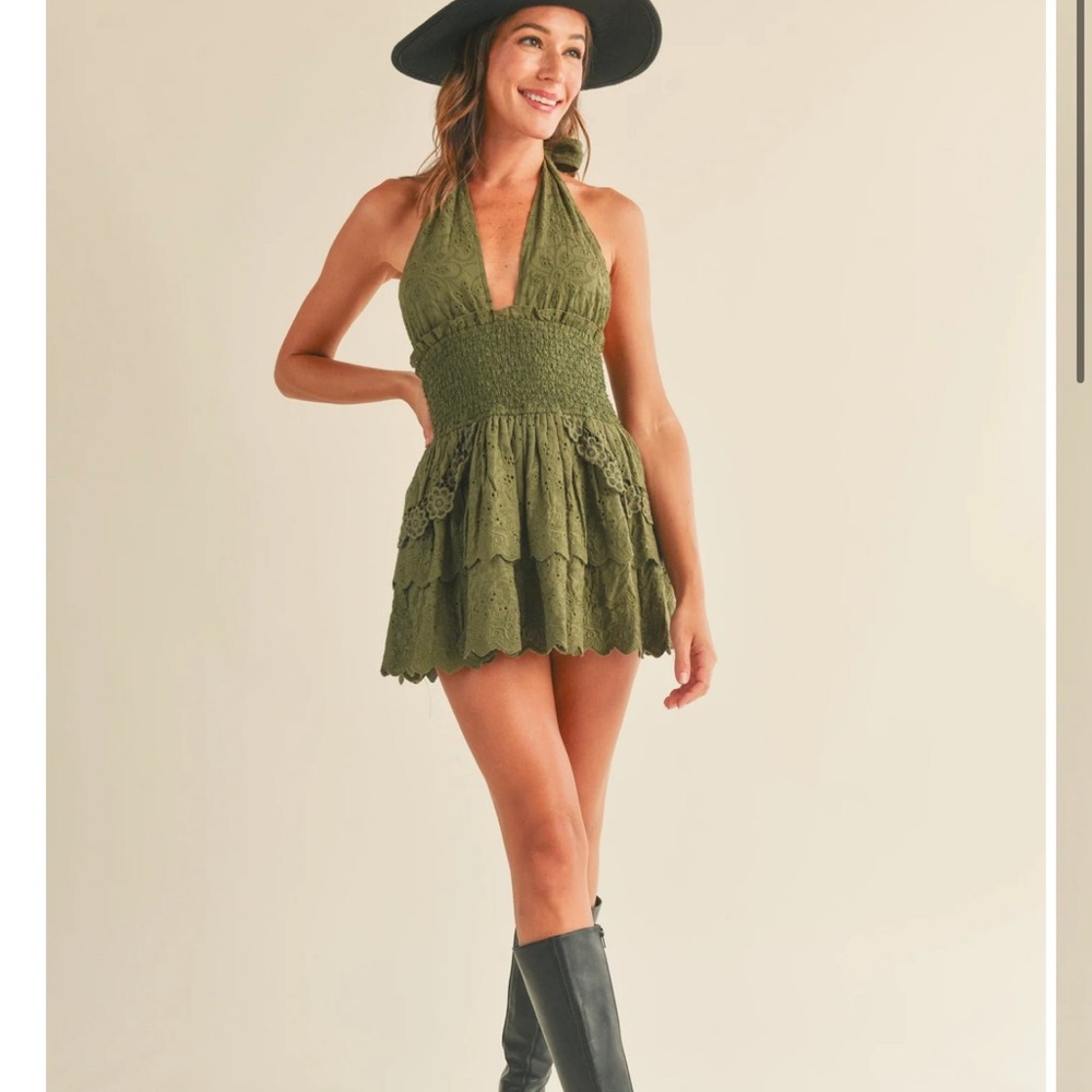 EYELET HALTER MINI DRESS IN OLIVE
Reset by Jane